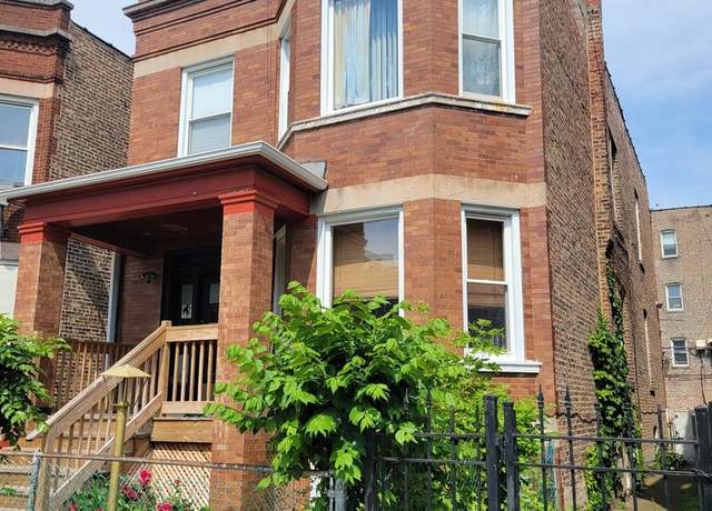 Property at 7125 S Cornell Ave, Chicago, IL 60649, 5 beds, 3 baths