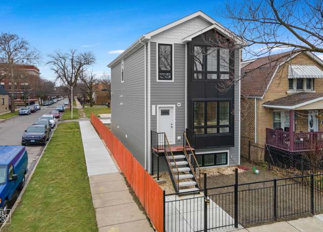 Property at 1100 N Kedvale Ave, Chicago, IL 60651, 4 beds, 3.5 baths