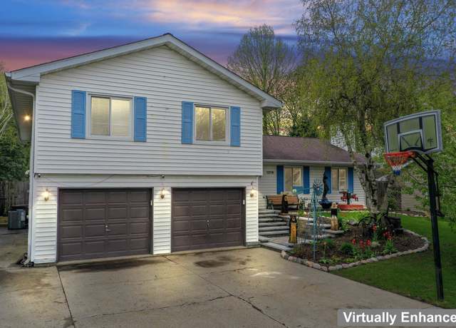 Property at 1218 Bunker St, Woodstock, IL 60098, 4 beds, 2.5 baths