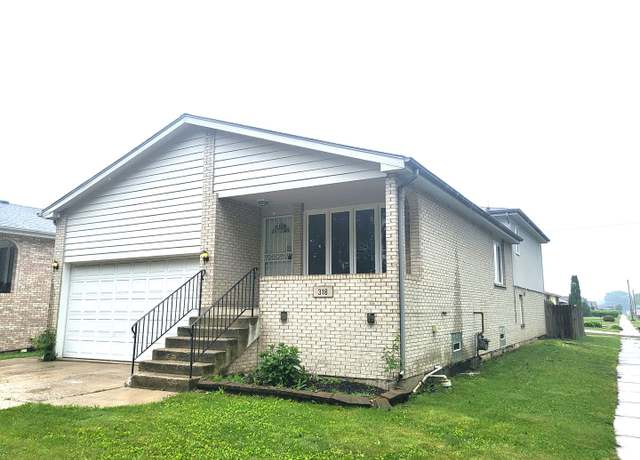 Property at 318 Campbell Ave, Calumet City, IL 60409, 4 beds, 2 baths