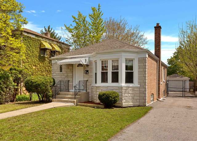 Property at 10015 S Emerald Ave, Chicago, IL 60628, 4 beds, 2 baths
