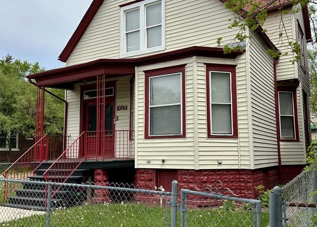 Property at 10749 S State St, Chicago, IL 60628, 4 beds, 2 baths