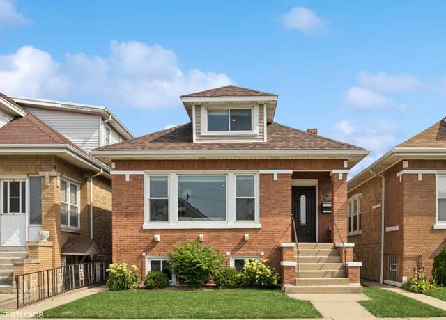 Property at 5814 W Addison St, Chicago, IL 60634, 5 beds, 2 baths