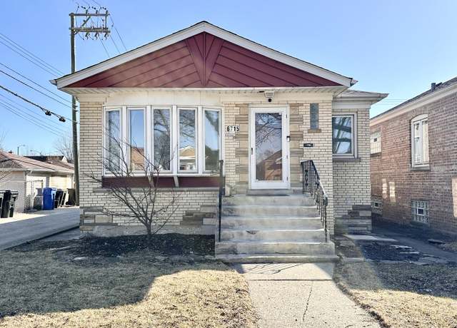 Property at 6715 S Tripp Ave, Chicago, IL 60629, 6 beds, 3 baths