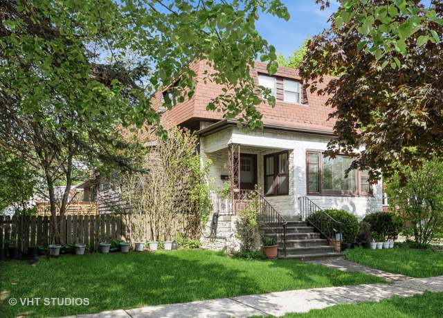Property at 1001 Elgin Ave, Forest Park, IL 60130, 4 beds, 3 baths