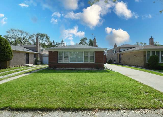 Property at 10945 S Lowe Ave, Chicago, IL 60628, 3 beds, 2 baths