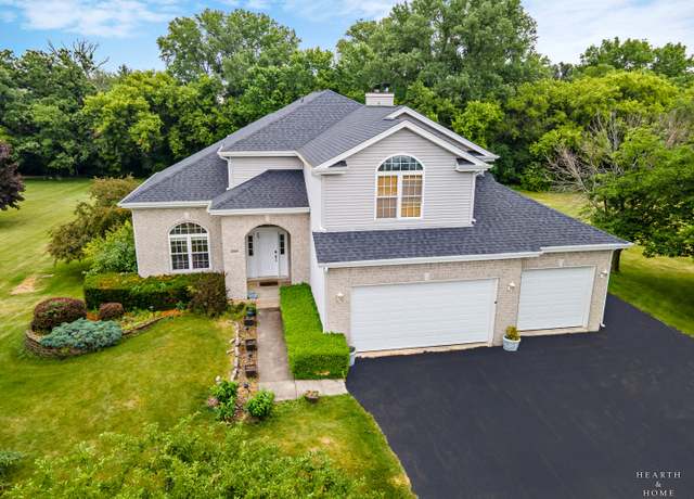 Property at 5008 Country Springs Dr, Johnsburg, IL 60051, 4 beds, 3 baths