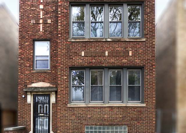 Property at 6923 S Merrill Ave, Chicago, IL 60649, 4 beds, 2 baths