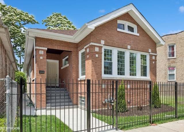 Property at 5942 S Emerald Ave, Chicago, IL 60621, 4 beds, 2 baths