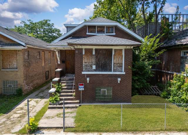 Property at 7028 S Carpenter St, Chicago, IL 60621, 4 beds, 2 baths