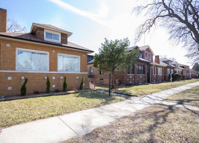 Property at 7621 S Clyde Ave, Chicago, IL 60649, 4 beds, 2 baths