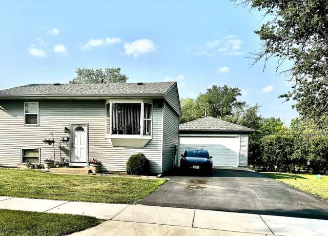 Property at 604 West Wind Dr, Carpentersville, IL 60110, 4 beds, 2 baths