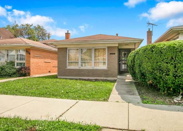 Property at 10049 S Indiana Ave, Chicago, IL 60628, 4 beds, 2 baths