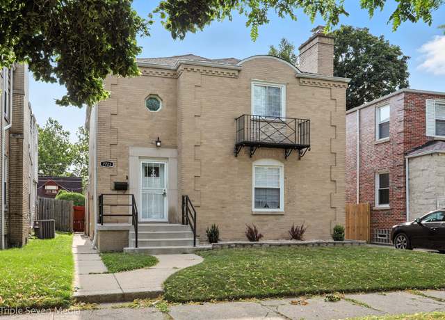 Property at 7723 S Paxton Ave, Chicago, IL 60649, 4 beds, 3 baths