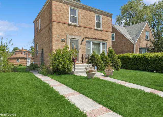 Property at 1242 E 98th St, Chicago, IL 60628, 2 beds, 1.5 baths