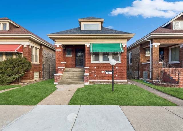 Property at 7931 S Calumet Ave, Chicago, IL 60619, 3 beds, 3 baths