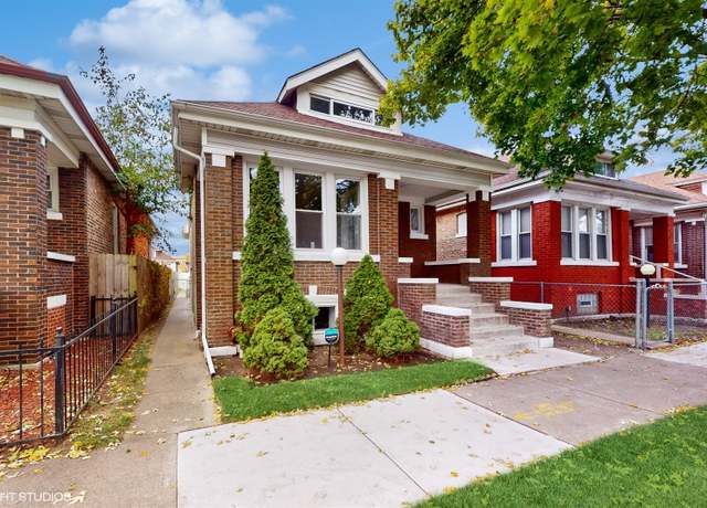 Property at 7750 S Rhodes Ave, Chicago, IL 60619, 4 beds, 3 baths