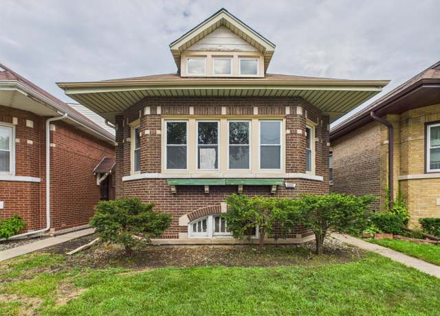Property at 9331 S Racine Ave, Chicago, IL 60620, 5 beds, 3 baths