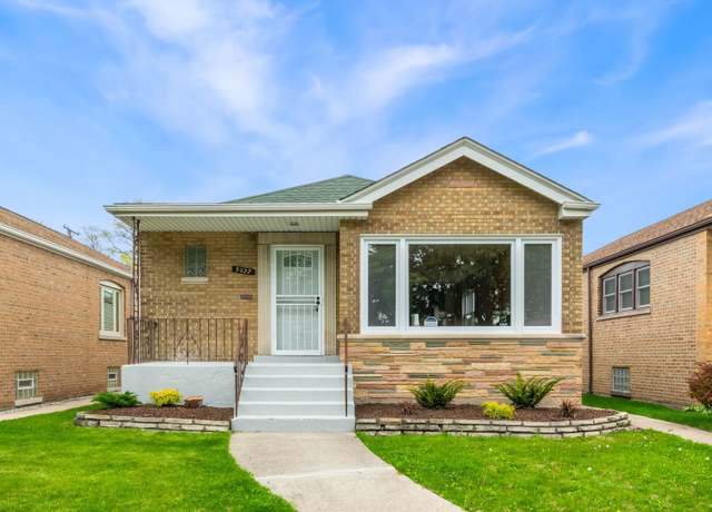 Property at 9037 S Paxton Ave, Chicago, IL 60617, 4 beds, 2.5 baths