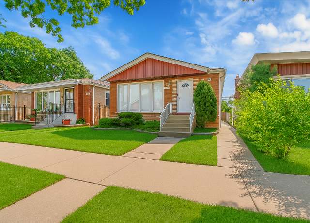Property at 9007 S Cregier Ave, Chicago, IL 60617, 4 beds, 2 baths