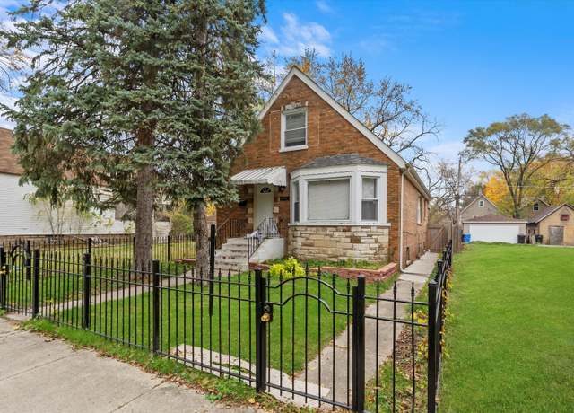 Property at 11931 S Prairie Ave, Chicago, IL 60628, 4 beds, 2 baths