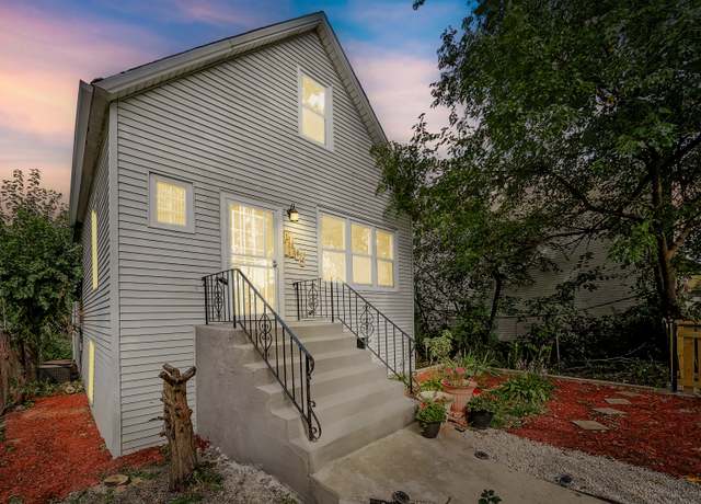 Property at 1560 E 93rd St, Chicago, IL 60619, 4 beds, 3 baths