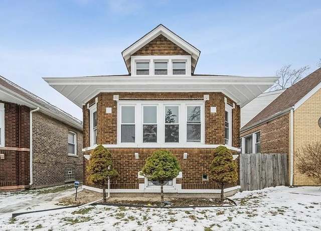Property at 8504 S Essex Ave, Chicago, IL 60617, 4 beds, 3 baths