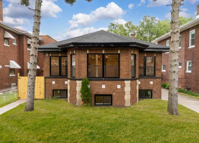 Property at 7427 S Oglesby Ave, Chicago, IL 60649, 6 beds, 4 baths