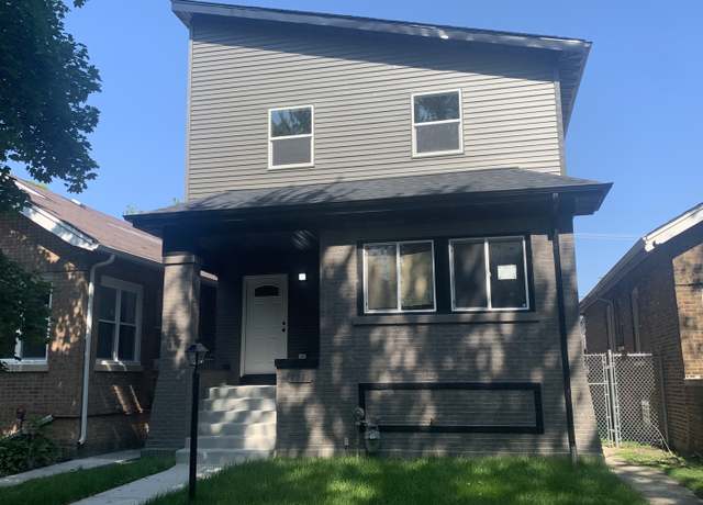 Property at 7711 S Ridgeland Ave, Chicago, IL 60649, 5 beds, 4.5 baths