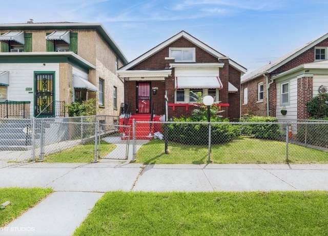Property at 9549 S Calumet Ave, Chicago, IL 60628, 4 beds, 3 baths
