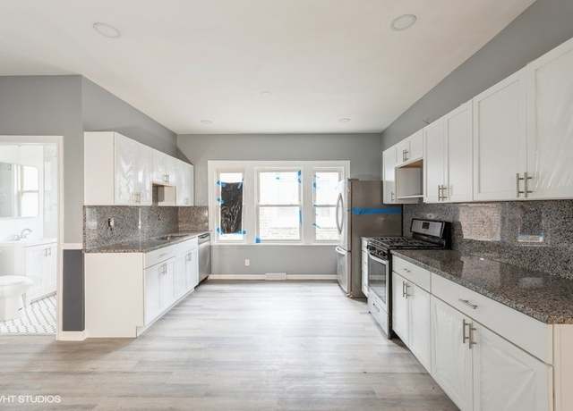 Property at 9549 S Calumet Ave, Chicago, IL 60628, 4 beds, 3 baths