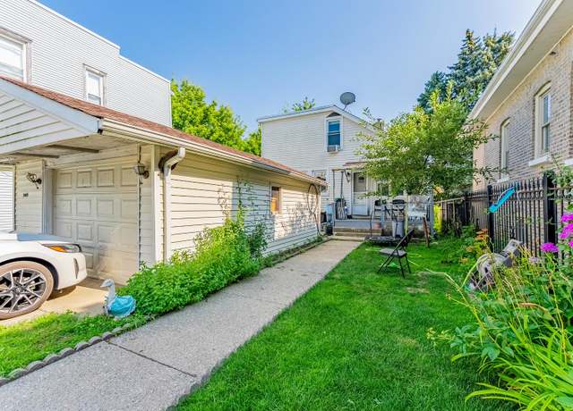 Property at 5009 W Addison St, Chicago, IL 60641, 5 beds, 3 baths