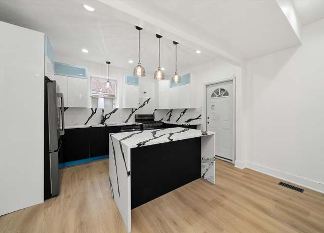 Property at 7129 S Michigan Ave, Chicago, IL 60619, 3 beds, 2.5 baths