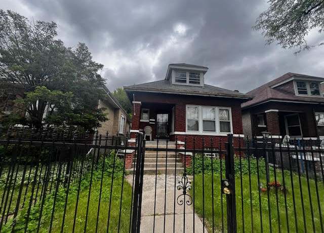Property at 1511 N Lockwood Ave, Chicago, IL 60651, 4 beds, 2 baths