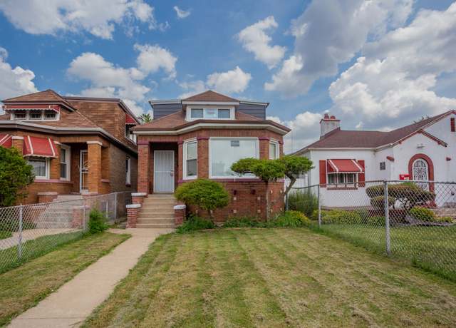 Property at 9309 S Ada St, Chicago, IL 60620, 5 beds, 3 baths