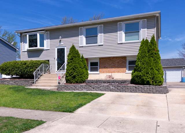 Property at 7736 167th St, Tinley Park, IL 60477, 4 beds, 2 baths