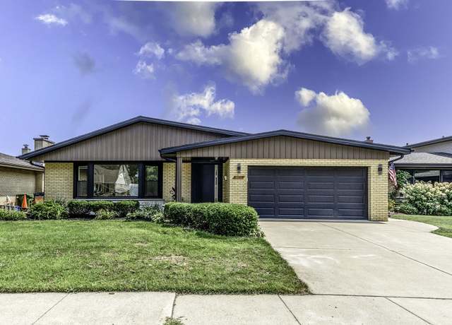 Property at 9825 S Kilbourn Ave, Oak Lawn, IL 60453, 4 beds, 3 baths