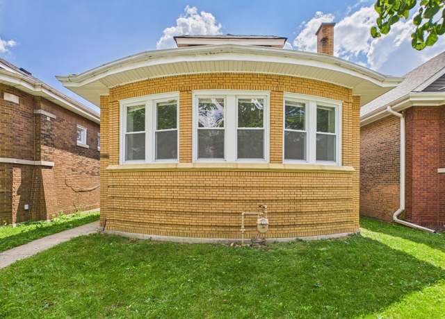 Property at 8015 S Paxton Ave, Chicago, IL 60617, 4 beds, 2 baths