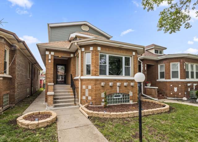 Property at 8114 S Paxton Ave, Chicago, IL 60617, 5 beds, 4 baths
