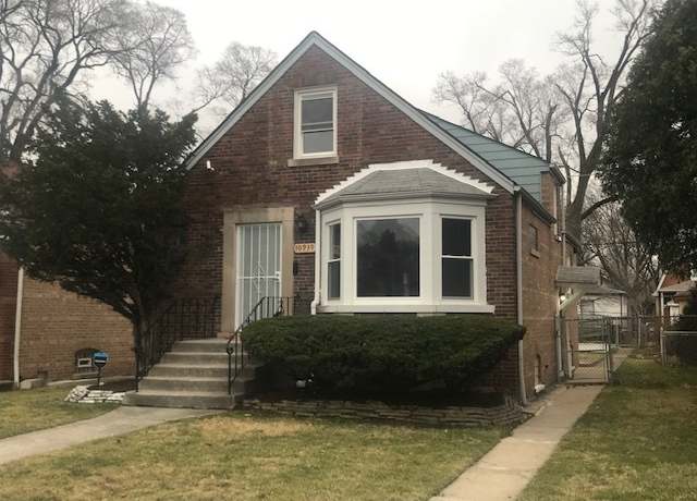 Property at 10939 S Normal Ave, Chicago, IL 60628, 4 beds, 2 baths