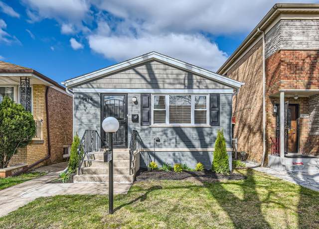 Property at 9814 S Lowe Ave, Chicago, IL 60628, 4 beds, 2 baths