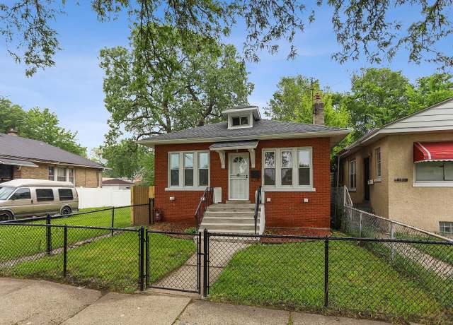 Property at 8235 S Woodlawn Ave, Chicago, IL 60619, 4 beds, 2 baths