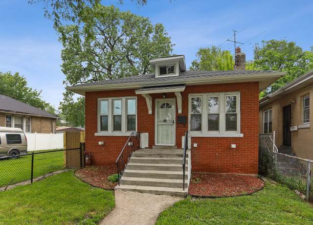 Property at 8235 S Woodlawn Ave, Chicago, IL 60619, 4 beds, 2 baths