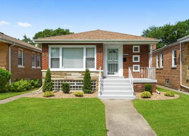 Property at 8414 S King Dr, Chicago, IL 60619, 4 beds, 2 baths