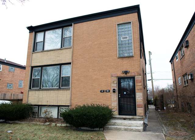Property at 1025 E 93rd St, Chicago, IL 60619, 5 beds, 3 baths
