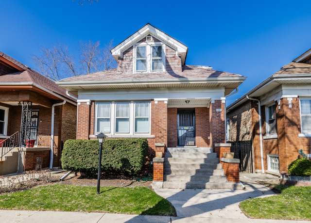 Property at 1522 N Lotus Ave, Chicago, IL 60651, 5 beds, 2 baths
