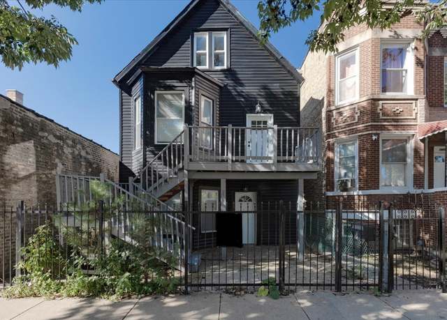 Property at 1406 N Kildare Ave, Chicago, IL 60651, 6 beds, 3 baths