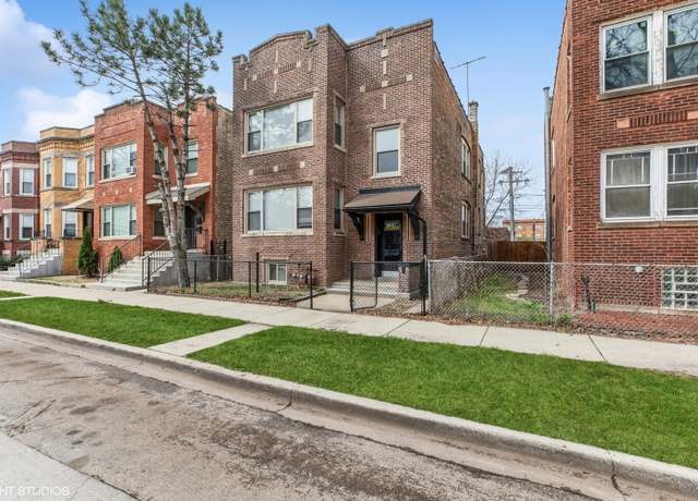 Property at 7204 S Cornell Ave, Chicago, IL 60649, 4 beds, 2 baths