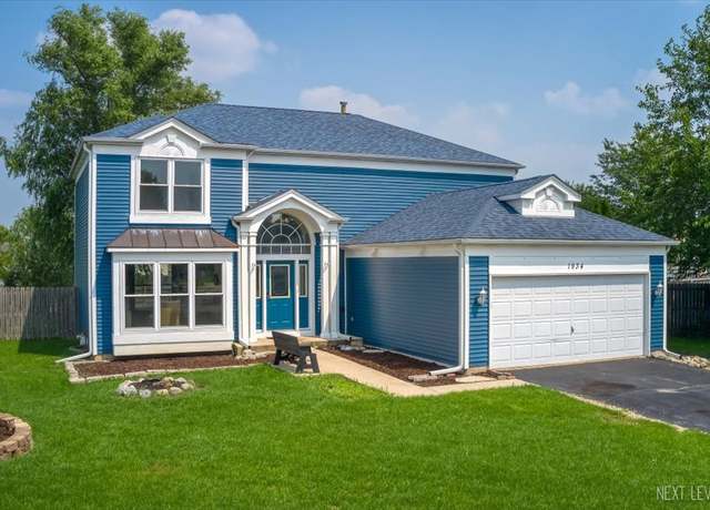 Property at 1934 Mission Hills Dr, Elgin, IL 60123, 4 beds, 3 baths