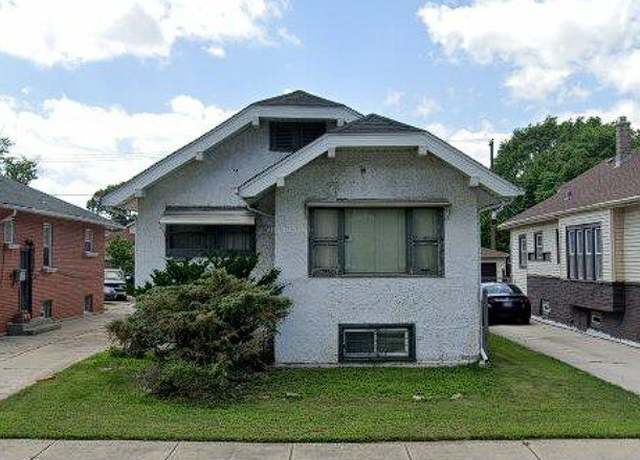 Property at 11344 S Parnell Ave, Chicago, IL 60628, 4 beds, 2 baths